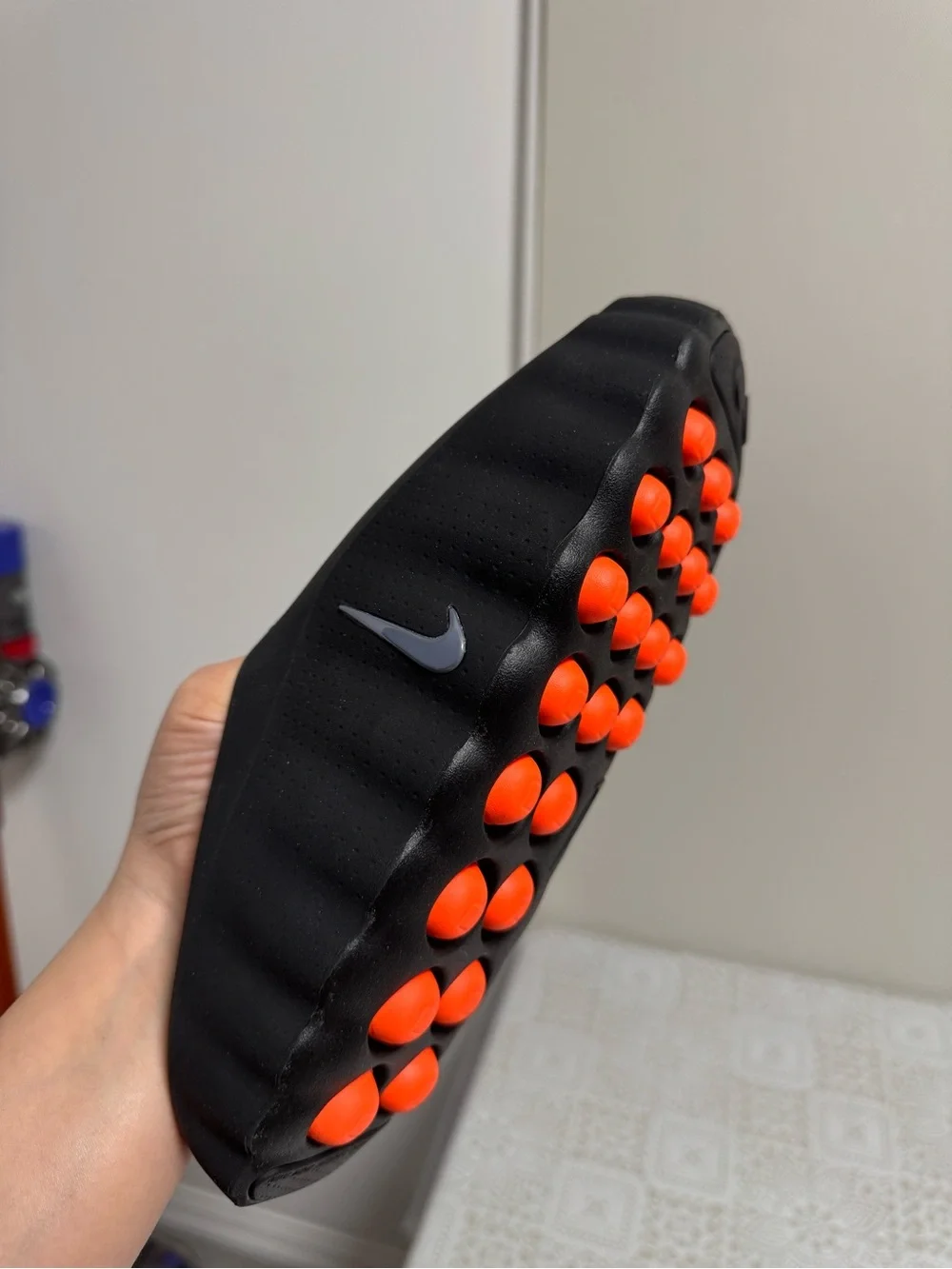 Brand new!They run SMALL! Nike Black Slip-On Mule with Bright Orange Studded Sol